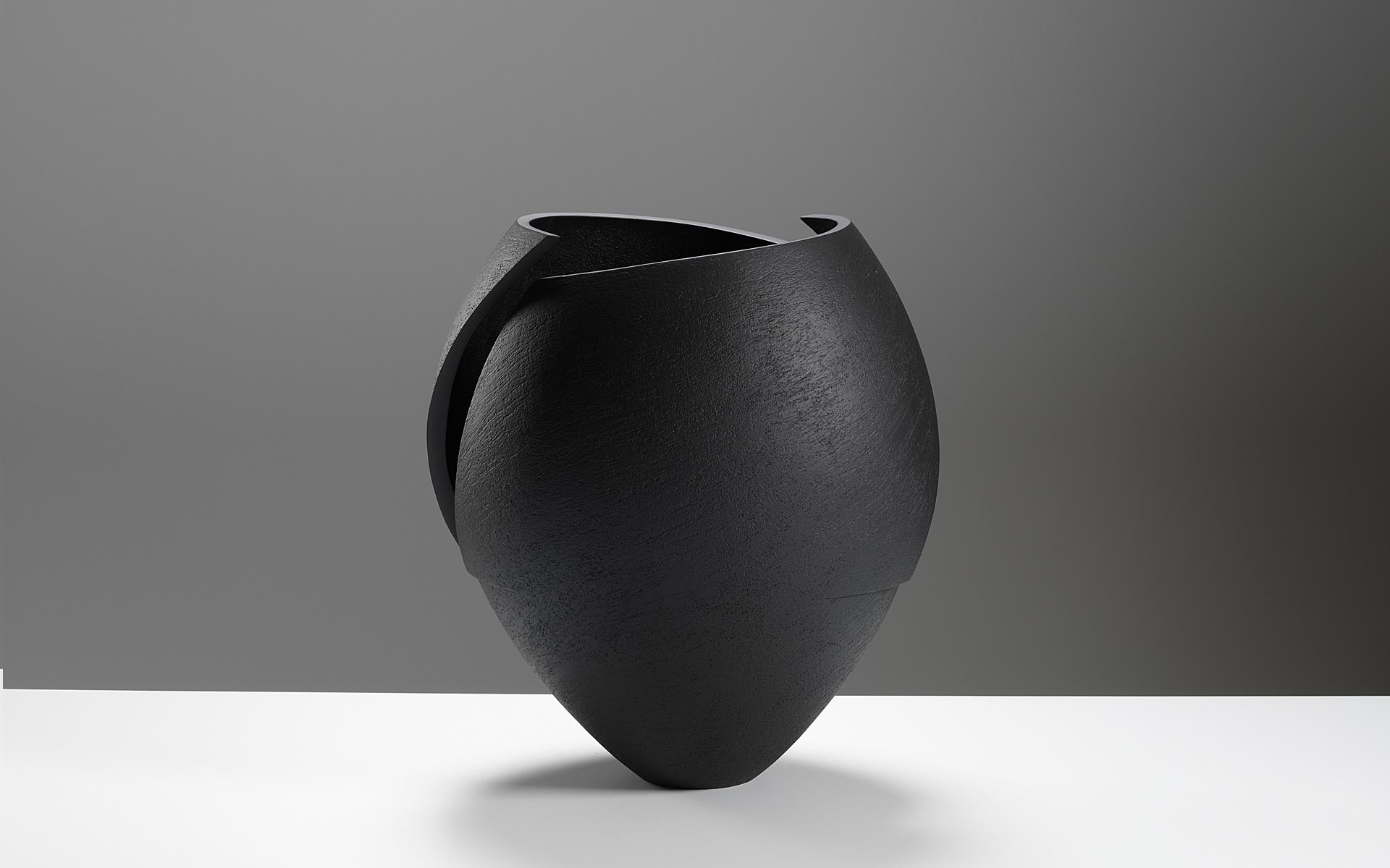 Cut and altered black bowl
